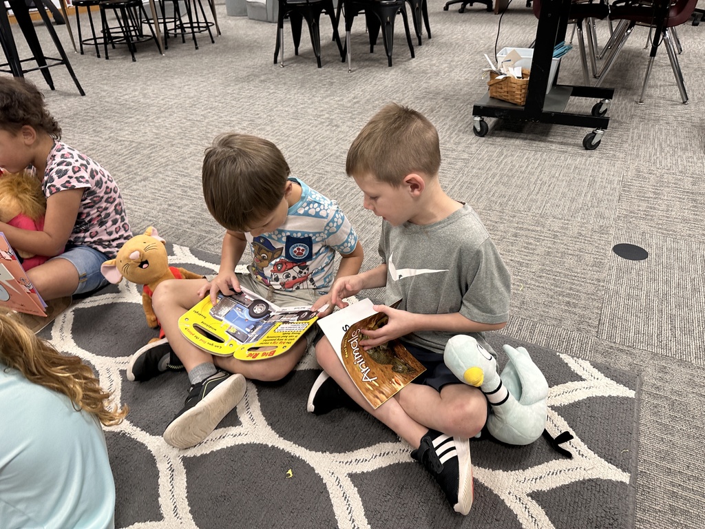 Mrs. Curtis' kindergarteners enjoyed visiting the library this week and reading with a buddy. #OneCommunityCommittedtoExcellence