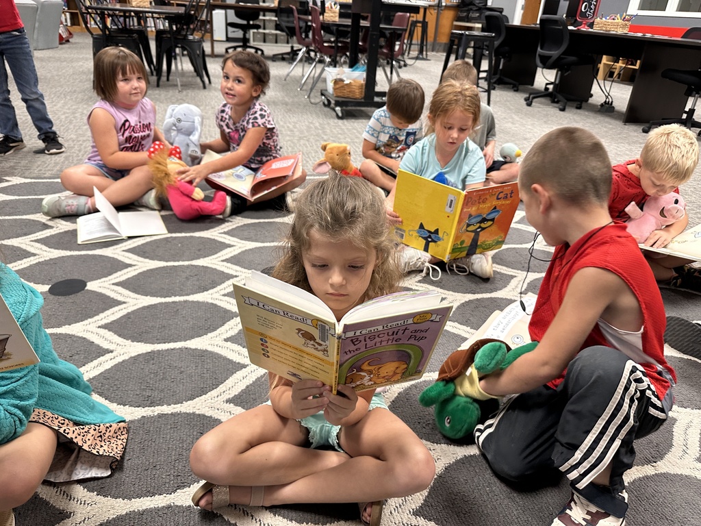 Mrs. Curtis' kindergarteners enjoyed visiting the library this week and reading with a buddy.  #OneCommunityCommittedtoExcellence