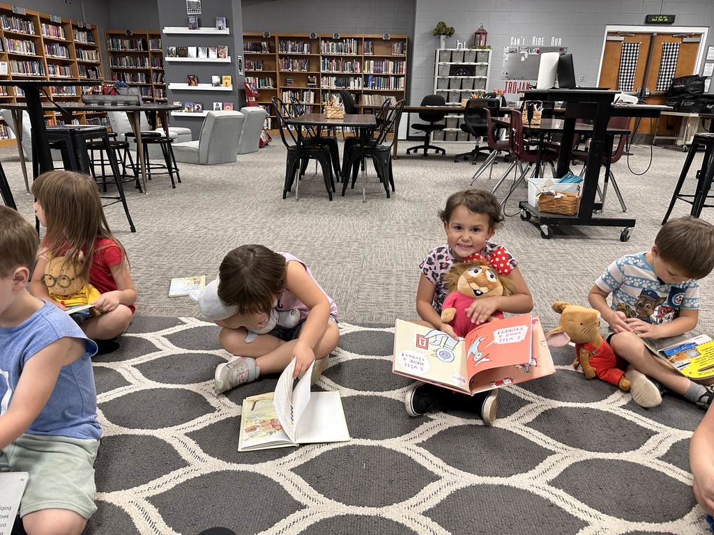 Mrs. Curtis' kindergarteners enjoyed visiting the library this week and reading with a buddy.  #OneCommunityCommittedtoExcellence
